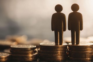 Foto: Figuren auf Münzstapel